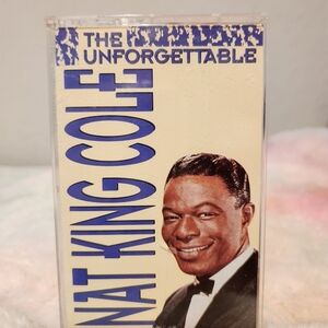 Nat King Cole The Unforgettable opened cassette tape.